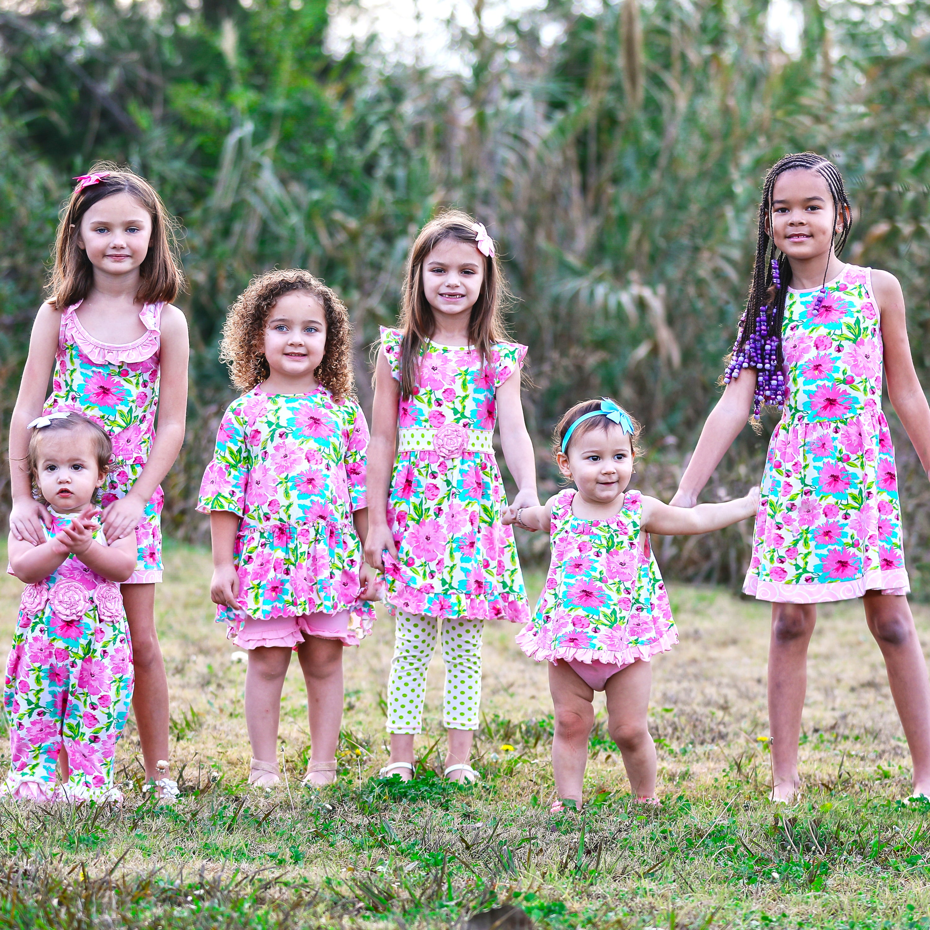 AnnLoren Little & Big Girls Floral Dress in green and pink, showcasing a vibrant floral pattern and sleeveless design, perfect for spring and summer.